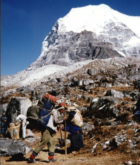 Sherpa Porters in Rolwaling Valley beneath Mount Chobutse