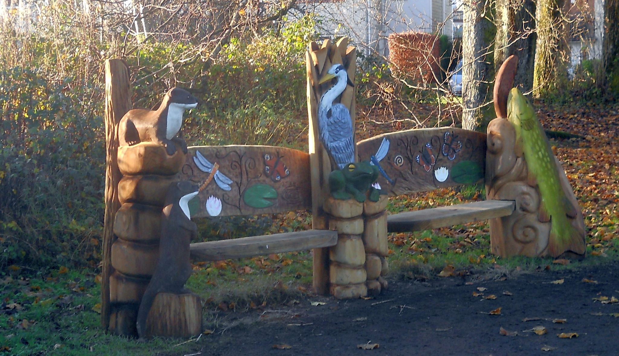 Carved Beech Log Bench at Kilmardinny Loch in Bearsden